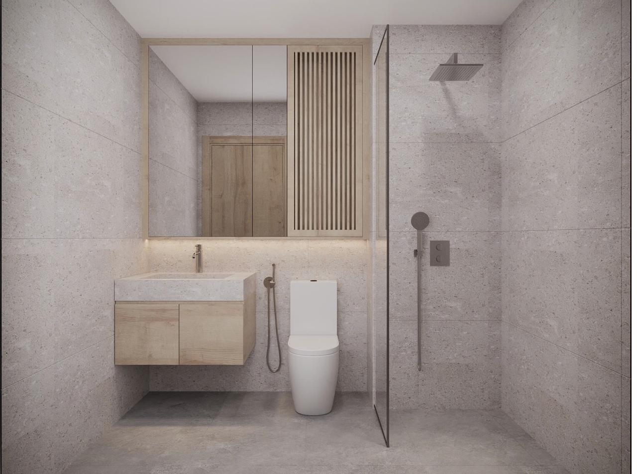 Stone-clad bathroom with rainfall shower, floating vanity and lit mirror cabinet